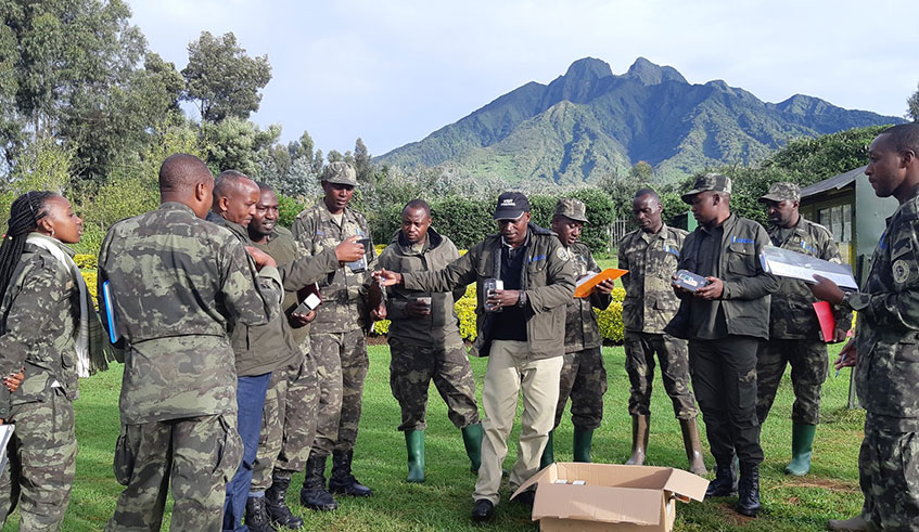 Game rangers in the Volcanoes National Park are some of the people that have so far received smartphones under the Connect Rwanda challenge. 