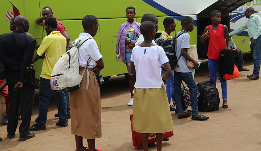 Students wait for buses at Nyabugogo bus terminal. Boarding primary and secondary school children started returning to school yesterday for their first term after long holidays. The academic calendar will begin on Monday, January 6. 
