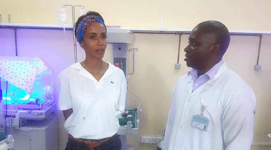 Sonia Rolland Uwitonze chats with the Director General of Ruhengeri Referral Hospital inside the hospitalu2019s neonatal intensive care unit. 