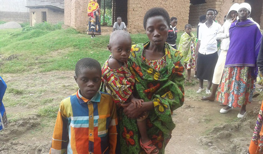Beu0301atrice Mukamazera, the deceased spouce with some of her children. 