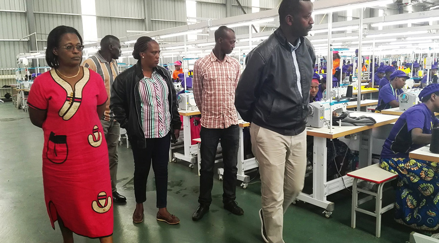 Members of parliament during a past site visit at a garment firm in Kigali. The lawmakers will, on Tuesday, begin a three-week tour across the country to assess both government and privately initiated projects. 
