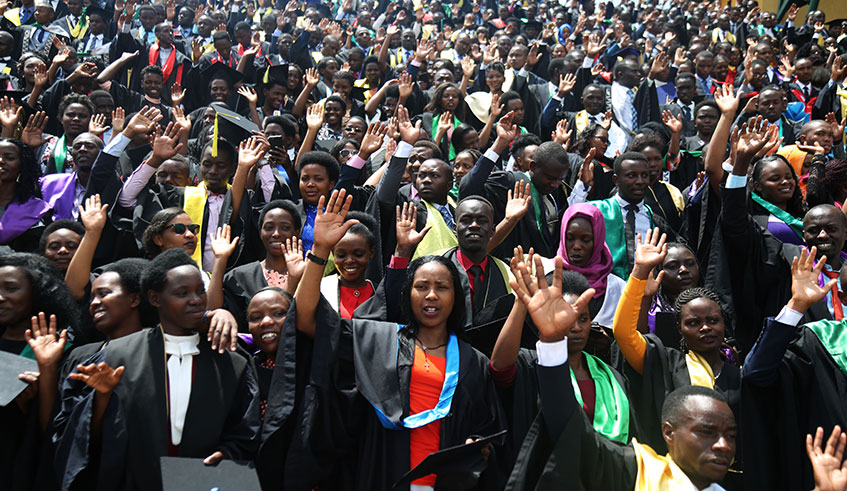 University of Rwanda students raise hands as they take oath on their graduation day in Huye District in November last year. Photo: Sam Ngendahimana.