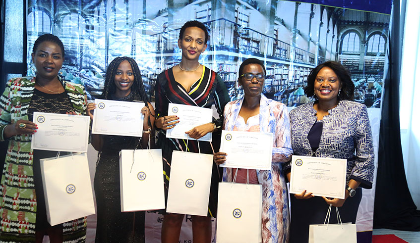 Kora Coaching & Business Academy graduates pose with their certificates after completing different courses on professional leadership coaching. 