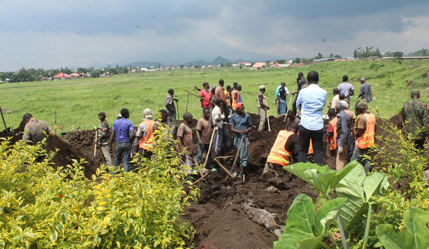 Rubavu District citizens and officials working tirelessly towards exhuming bodies found at Gisenyi Airport, they exhumed 28 bodies at the first day. 