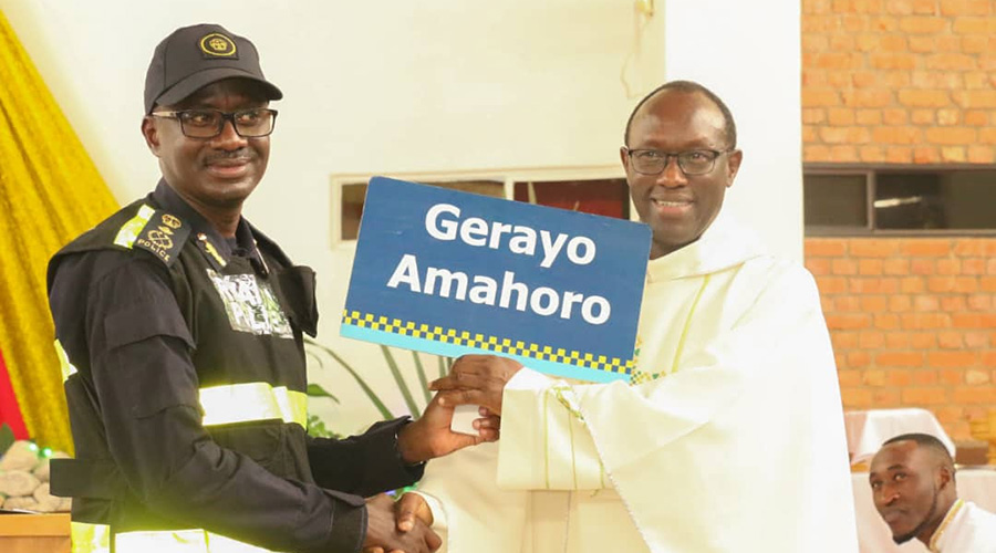 CP John Bosco Kabera and Father Consolateur of St Michel Cathedral after service on Sunday. 