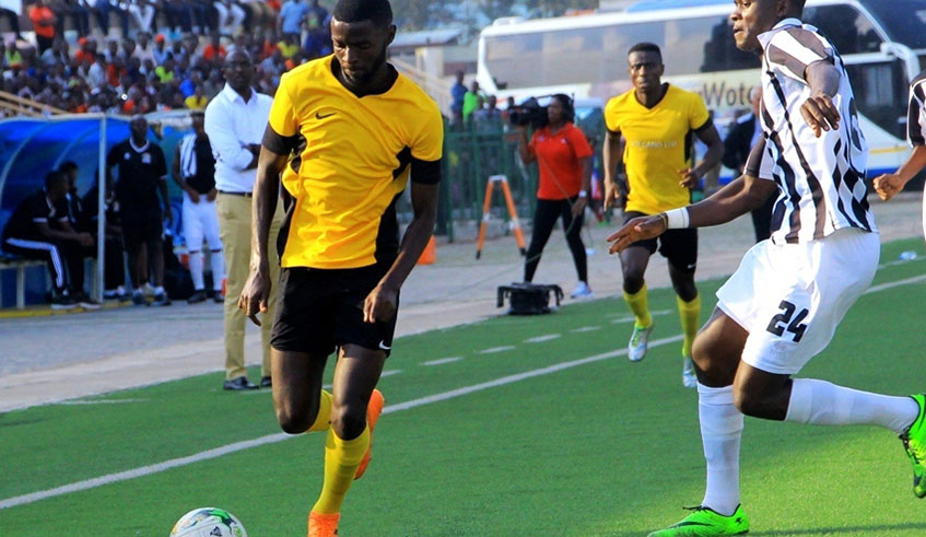 Mukura VS striker Bertrand Iradukunda tries to go past APR FC Left back Emmanuel Imanishimwe during the league match last year. 