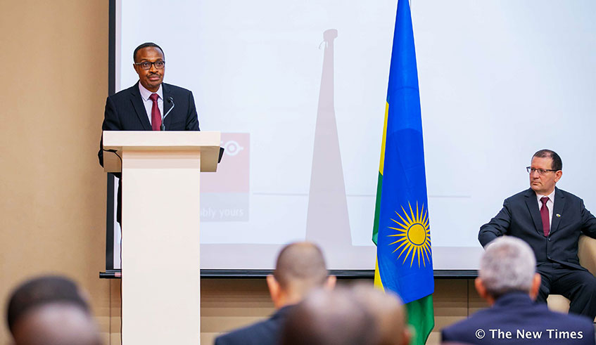 Defence Minister Maj Gen Albert Murasira addresses the seminar as Brig Gen (Rtd) Yair Kulas, Director of SIBAT looks on in Kigali Yesterday 