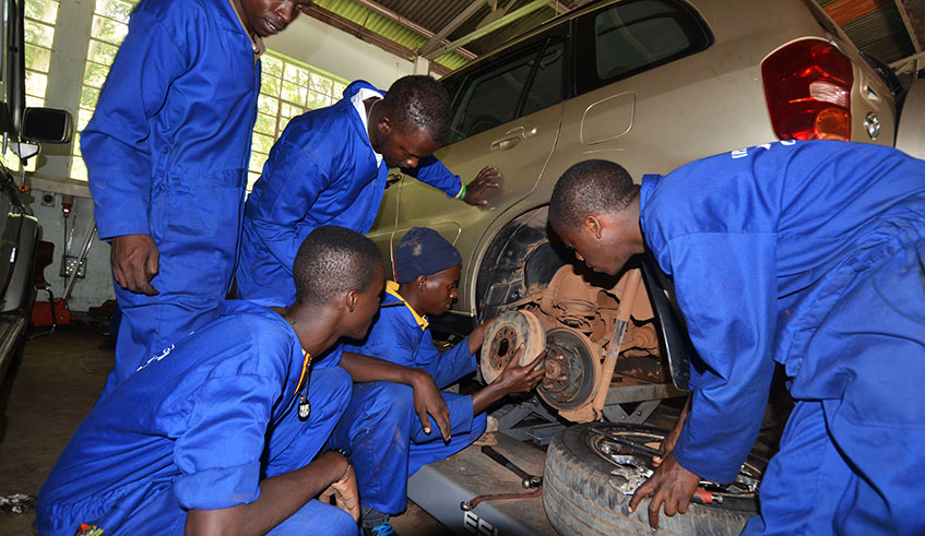 Automative engineering students at IPRC-Kigali during practical class. 