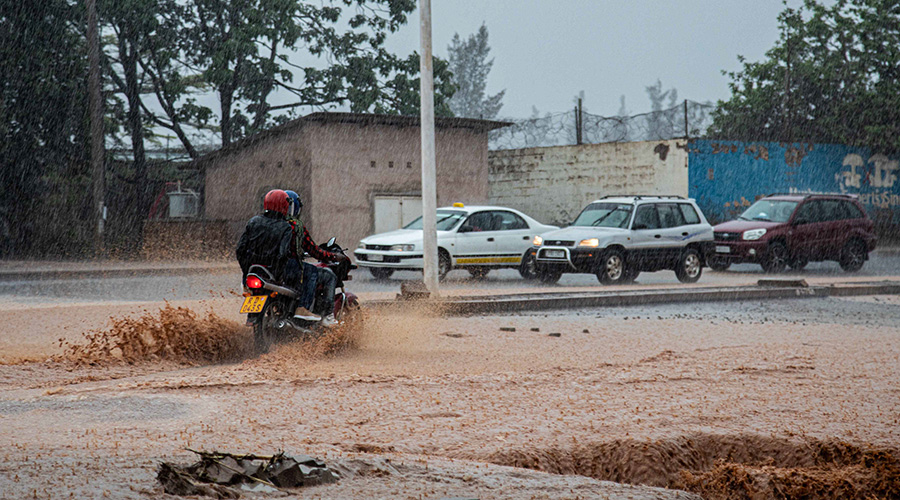 Motorists try to navigate through a flooded road at Rwandex, along the Sonatubes-Kanogo road last year. The Rwanda Metrological Agency has predicted more than average rainfall between January and March. According to the weatherman, between September and December, the country received unusual rainfall over the last ten years. 