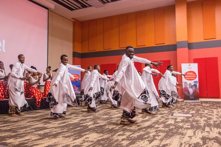 A cultural troupe entertains guests during the celebration of Airtelâ€™s eighth anniversary on the Rwanda market in Kigali on January 16. 