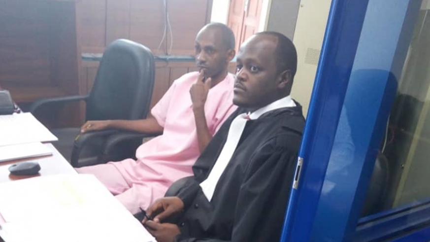 Nsabimana and his lawyer Mou00efse Nkundabarashi during a past court hearing. 