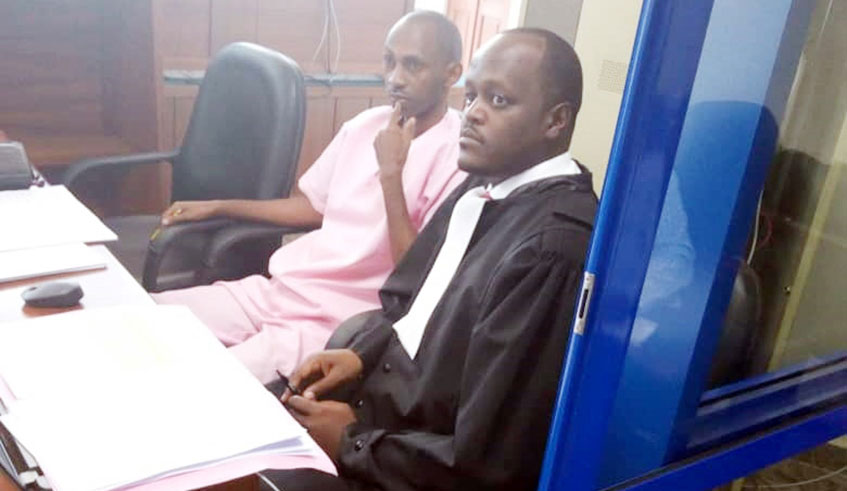 Nsabimana and his lawyer Mou00efse Nkundabarashi during a past court appearance.