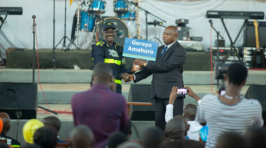 Commissioner of Police (CP) John Bosco Kabera and Rev. Ephreem Karuranga, the Legal Representative of the Pentecost Church of Rwanda (ADEPR) after service in Remera Parish, in Gasabo District on January 19, 2020. 