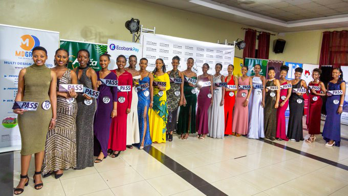 The 20 ladies who will represent Kigali City at Miss Rwanda beauty pageant show off their passes. 