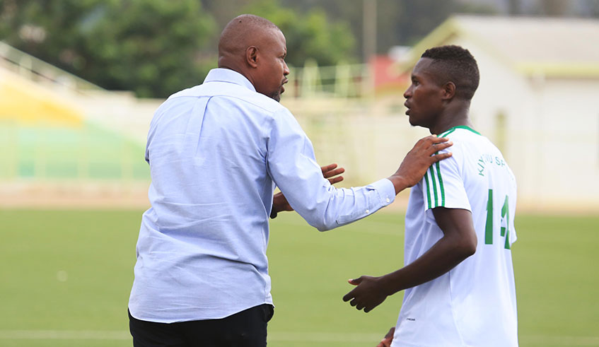 Andre Cassa Mbungo gives instructions to a player during his time at SC Kiyovu. FERWAFA has ordered the club to clear salary arrears owed to their former coach or face a transfer ban. 