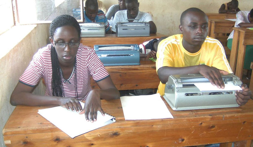 Visually impaired people in class at Masaka Resource Centre For The Bilnd. 