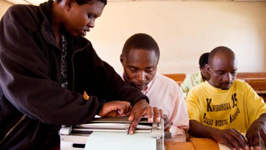 Visually impaired students during a lesson at Masaka School of the Blind.