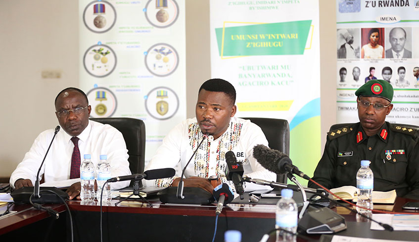 (L-R) The Chancellor of the Chancellery for Heroes, National Orders and Decorations of Honour, Pierre-Damien Habumuremyi, Minister of State in the Ministry of Youth and Culture, Edouard Bamporiki, and Director of Rwanda Peace Academy Col Jules Rutaremara  during Press Conference in Kigali yesterday. 