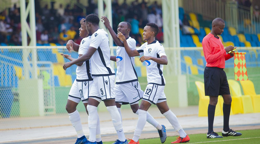 APR celebrate after Innocent Nshuti (#17) scored the third goal during their 3-1 win over Mukura at Kigali Stadium on Saturday. 