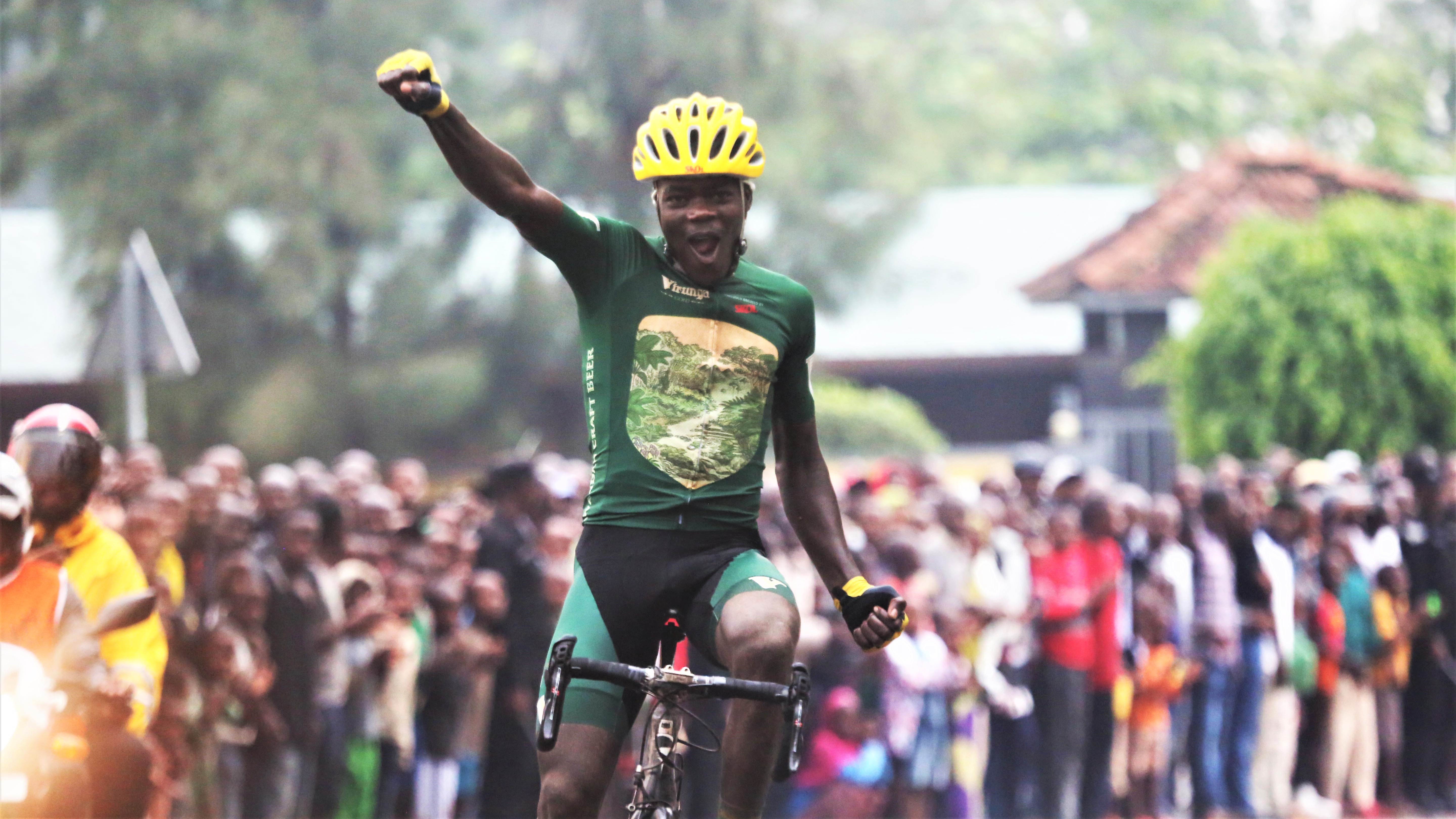 Jean Eric Habimana, 19, celebrates his solo finish after crossing the line to win the inaugural Heroes Cup in Nyamirambo on Sunday. Photo: 