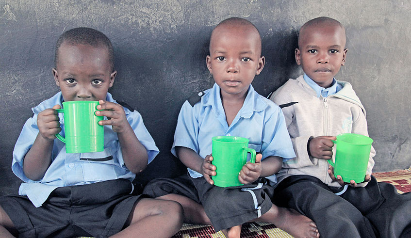 Children drink milk at Mageragere Early Child Development Centre in Nyarugenge District. 