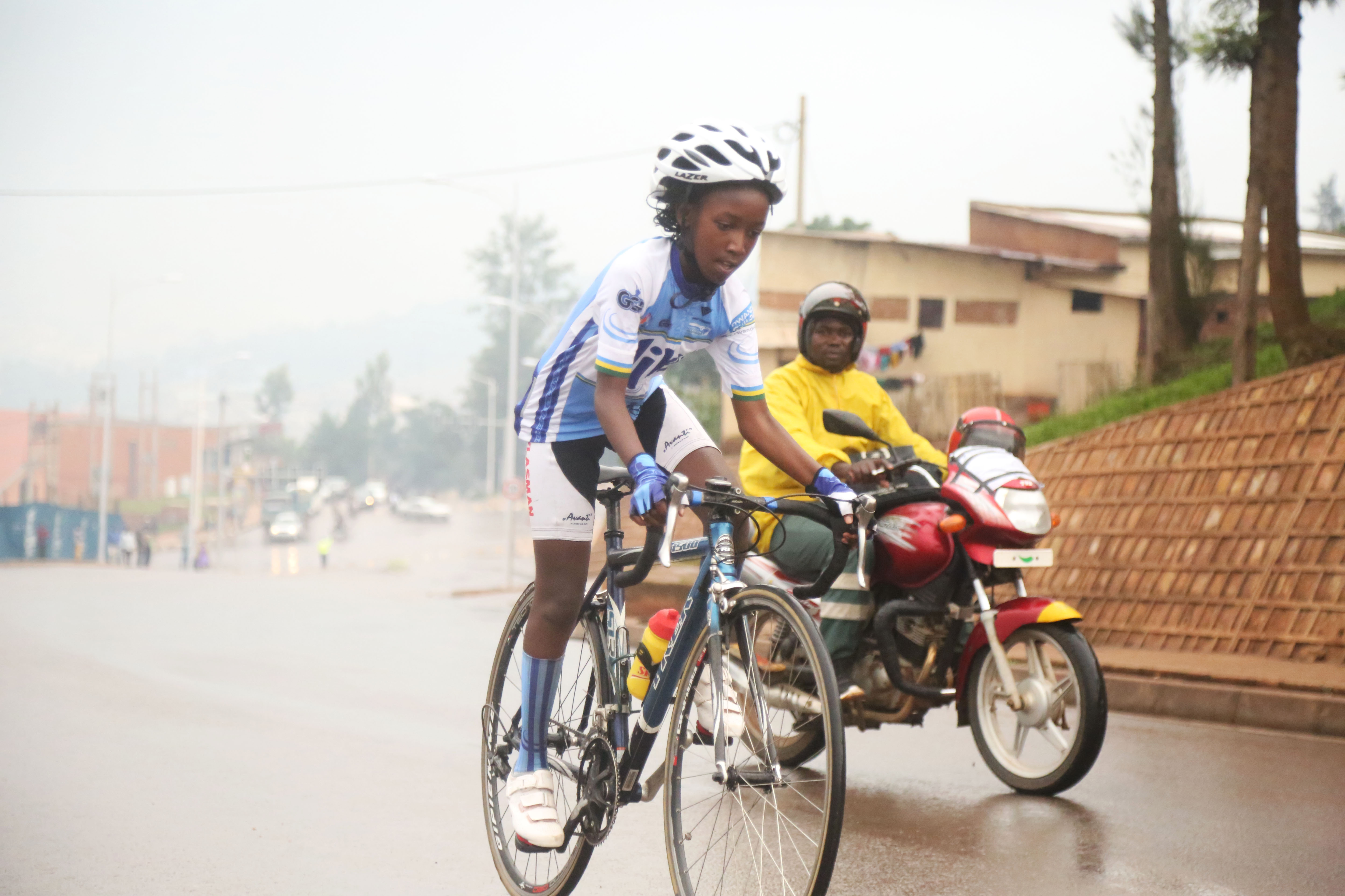 Jean Eric Habimana, 19, celebrates his solo finish after crossing the line to win the inaugural Heroes Cup in Nyamirambo on Sunday. Photo: 