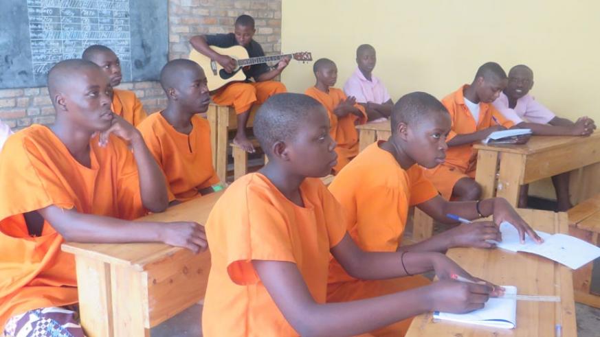 Juveniles attend a music lesson at the Nyagatare Juvenile Prison. The facility offers the young inmates a chance to pursue their education.