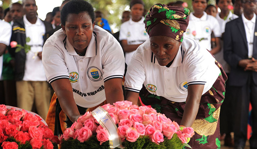 Some of Ingenzi Heroes lay wreath on the grave of  Imena Hero Valens Ndemeye, a former Nyange student  killed on March 18, 1997 by a militia. 