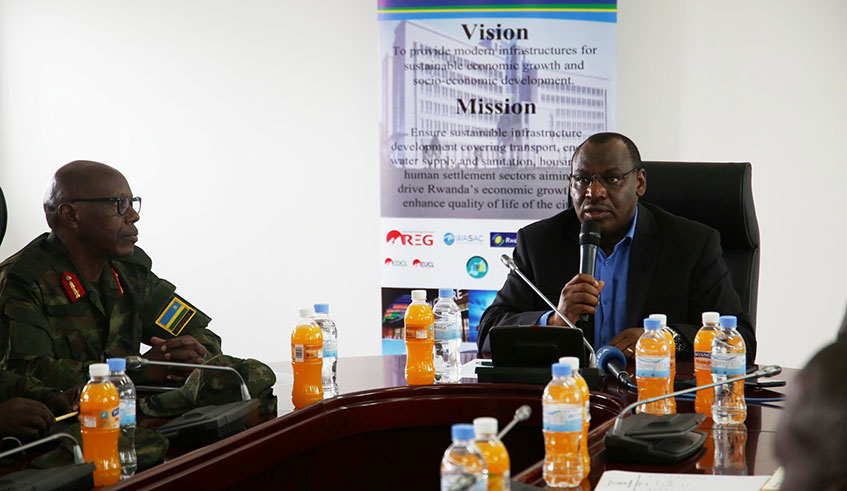 Minister of Infrastructure, Clever Gatete (in suit) with Senior Army Commanders from different African countries who are on 5-day study tour to learn about Rwandaâ€™s settlement system. / Craish Bahizi.