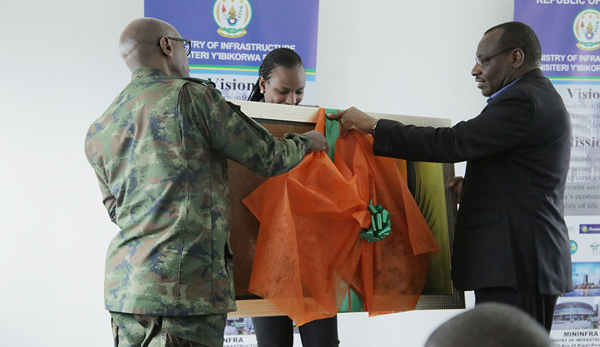 Minister of Infrastructure, Clever Gatete (in suit) with Senior Army Commanders from different African countries who are on 5-day study tour to learn about Rwandaâ€™s settlement system. / Craish Bahizi.