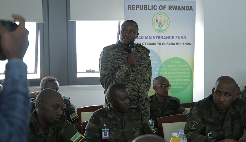 Minister of Infrastructure, Clever Gatete (in suit) with Senior Army Commanders from different African countries who are on 5-day study tour to learn about Rwandaâ€™s settlement system. / Craish Bahizi.