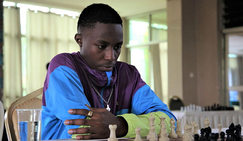 Ben Patrick Cyubahiro, seen here playing his final round on Monday, was the best young player of the tournament. / Craish Bahizi.