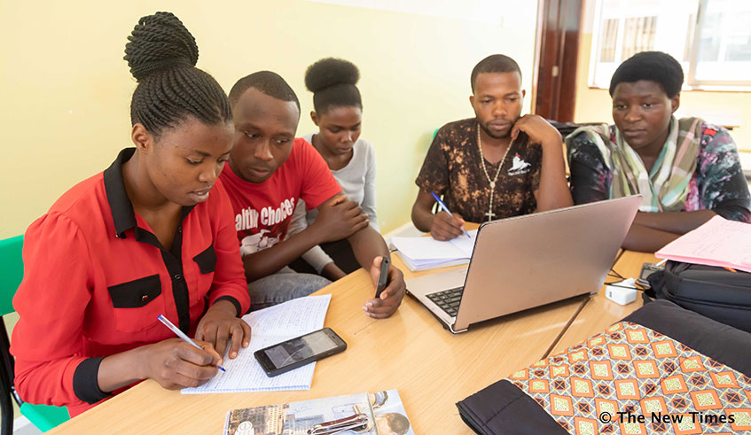 A group of University of Rwanda - College of Business and Economicsu2019 young students working on an assignment as a team in Kigali on January 21, 2020. Teams are a fact of life in the modern workplace in Rwanda and around the world. 