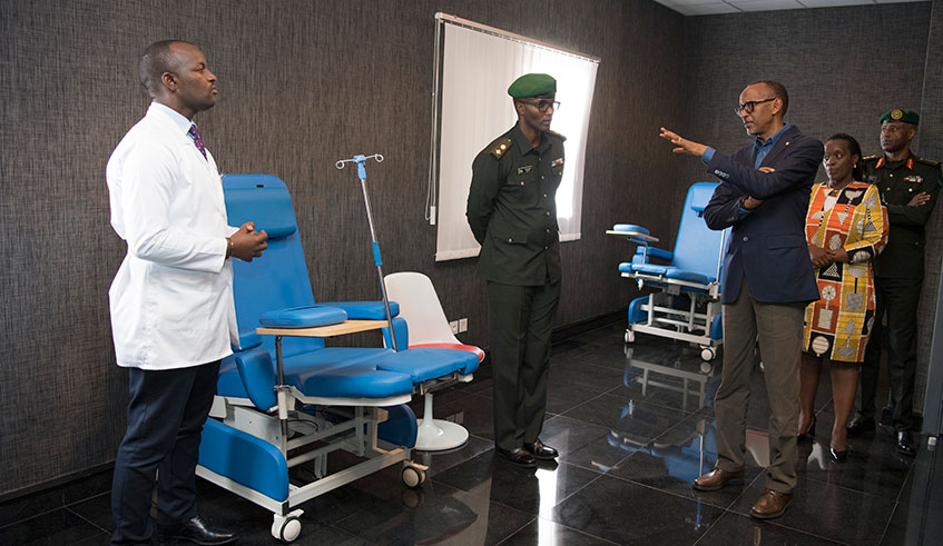 President Paul Kagame speaks after officially launching the Rwanda Cancer Centre at Rwanda Military Hospital in Kanombe on Tuesday, February 4. Looking on are (left-right), Dr Fidel Rubagumya; Lt Col Dr Pacific Mugenzi; Health minister Dr Diane Gashumba, and RDF Chief of Defence Staff, Gen Jean-Bosco Kazura.  / Photo: Village Urugwiro.