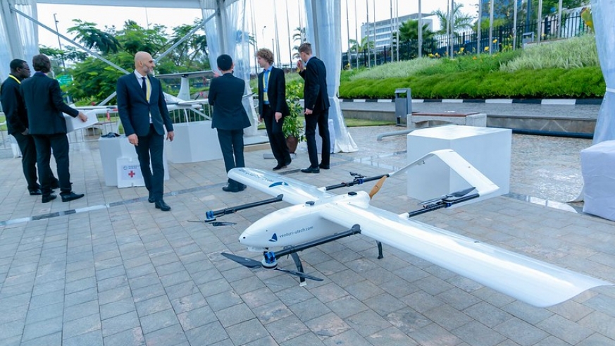Youths inspect a first Made in Rwanda Drone at the first Africa Drone Forum in Kigali on February 5, 2020. / Emmanuel Kwizera