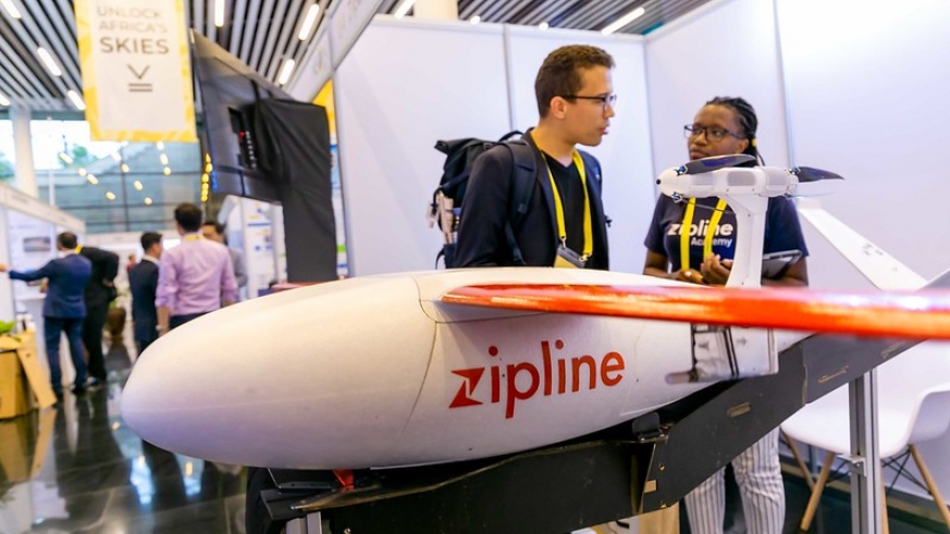 Youths inspect a first Made in Rwanda Drone at the first Africa Drone Forum in Kigali on February 5, 2020. / Emmanuel Kwizera