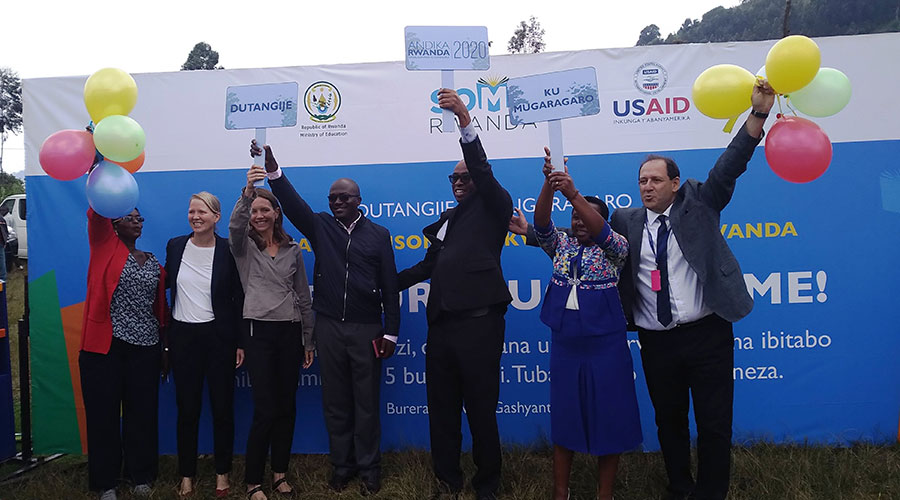Officials from the Ministry of Education and their counterparts from the United States Agency for International Development (USAID) launch national reading campaign in Burera District on Wednesday. 
