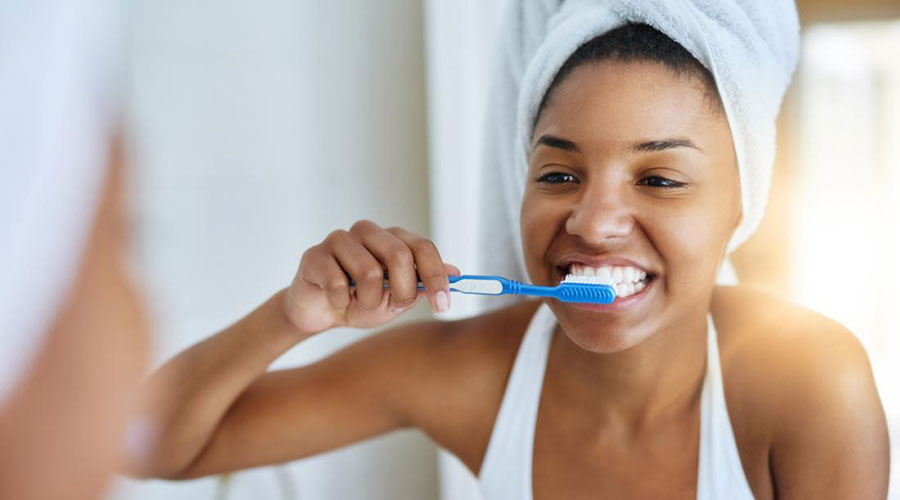 It is essential to use a soft-bristled toothbrush and brush teeth gently twice or thrice a day.