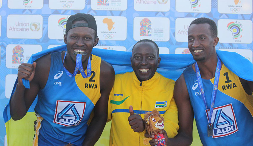 Patrick Kavalo Akumuntu (L) and Olivier Ntagengwa (R), seen here with coach Christophe Mudatsikira, won bronze medals at the 2019 All-Africa Games in Morocco. /Courtesy photo.