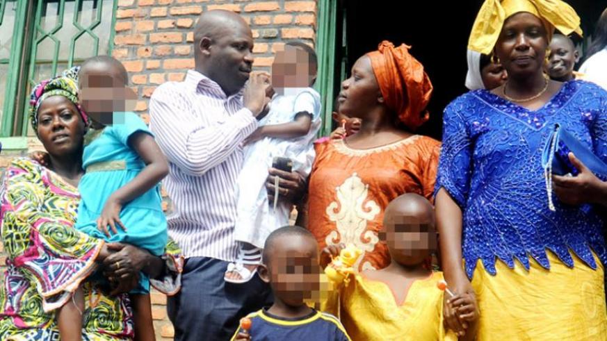 Foster families pick children from Mpore Pefa Orphanage in Gikondo before its closure. (File)