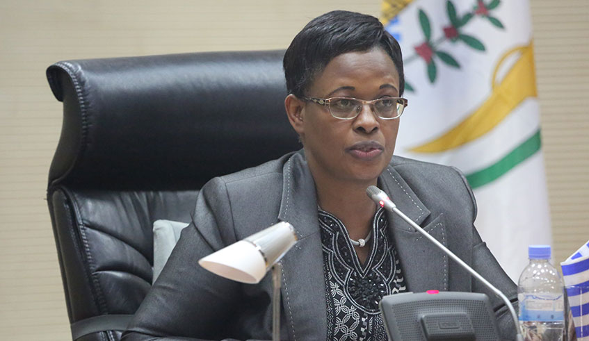 Mukabagwiza presents the report on issues affecting ICT in education and service delivery. / Courtesy.