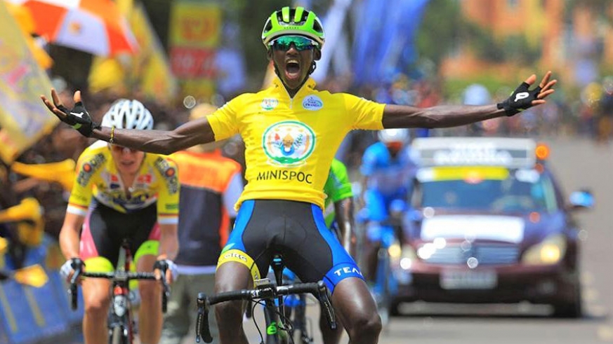 Samuel Mugisha, seen here celebrating as he crossed the line to win the 2018 Tour du Rwanda, is one of the only two former winners of the race in this yearâ€™s peloton./ File photo.