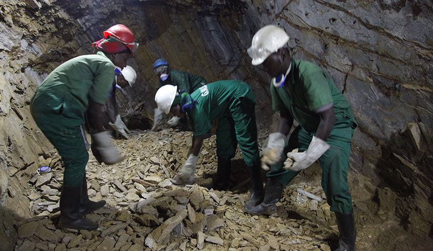 Miners at work inside Mageragere mining site in Nyarugenge District. / File.