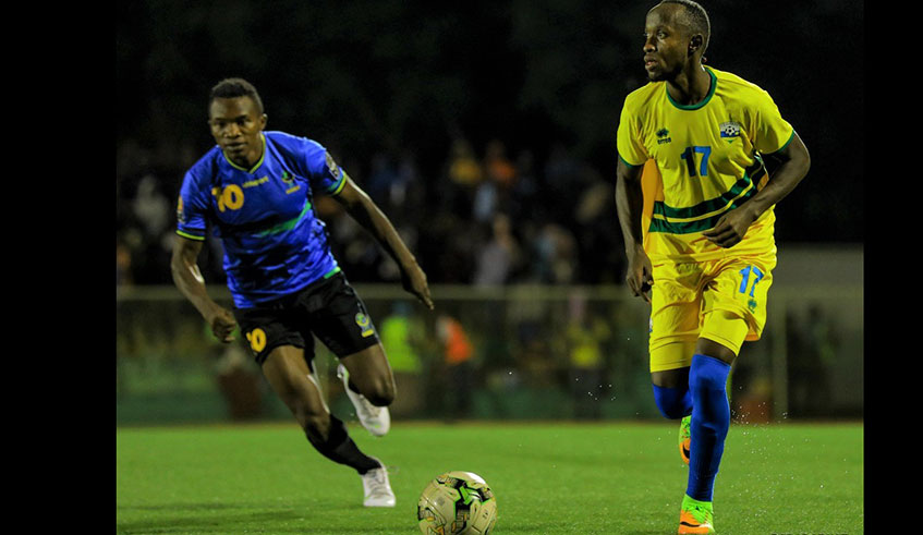 Centre-back Thierry Manzi (L), seen here during a past friendly match against Tanzania, is likely to captain Rwanda at this yearu2019s African Nations Championship in Cameroon. / Courtesy.