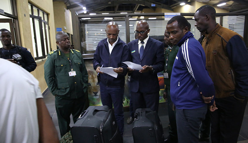 Some of the 15 Rwandans handed over to Rwanda at Kagitumba Border post on February 19. / Craish Bahizi.