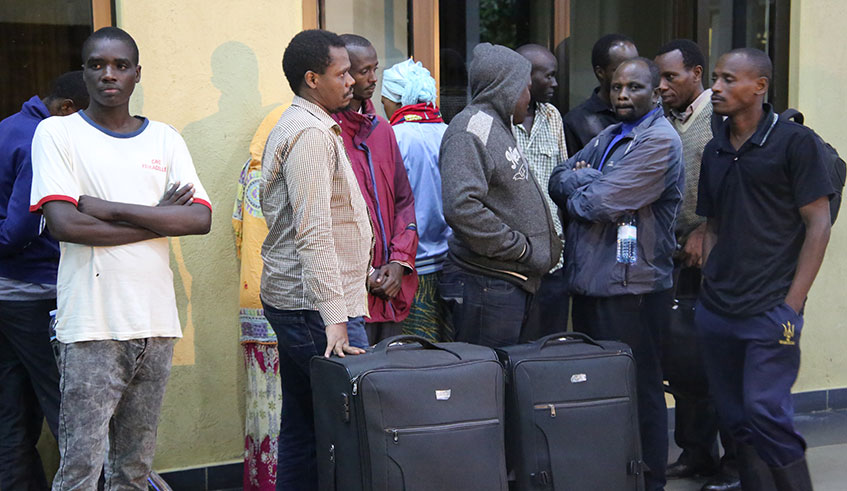 Some of the Rwandans who were handed over by the Ugandan government on arrival at the Kagitumba border post in the wee hours of Wednesday morning. Many of them recounted harrowing tales of torture during their illegal detention in the neighbouring country. / Craish Bahizi