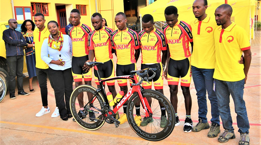 Adrien Niyonshuti (2nd-R) is the Sports Director and head coach of the Skol-sponsored cycling team. 