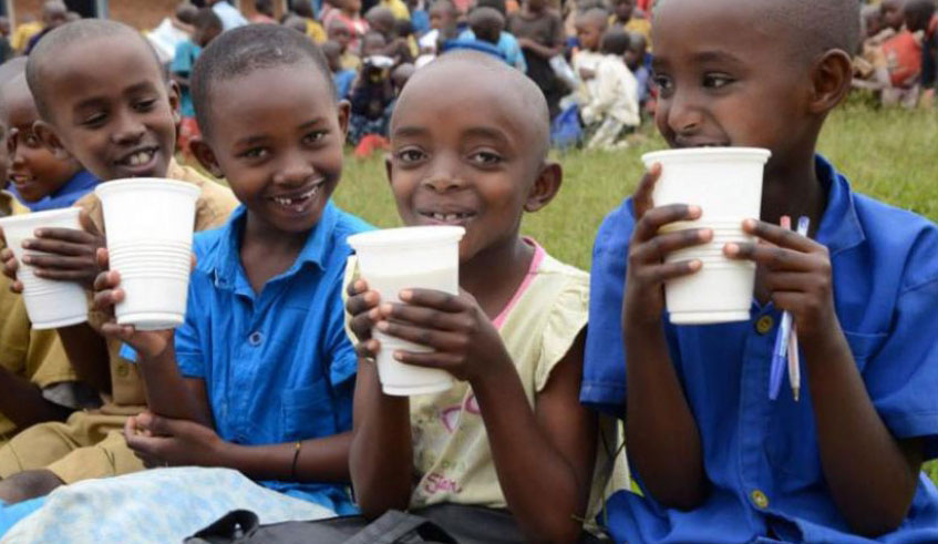 Pupils in Bugesera District drink milk at school. / Sam Ngendahimana.