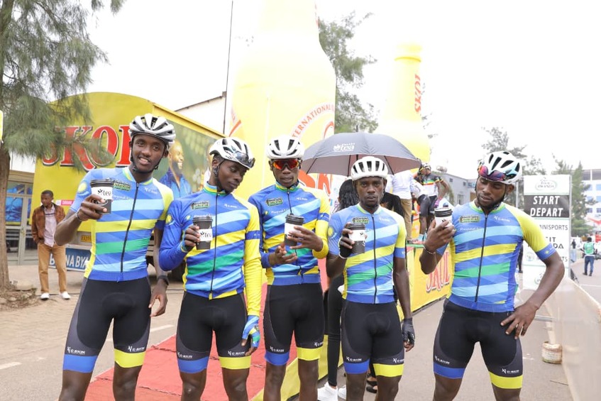 Samuel Mugisha (L), seen here with teammate Joseph Areruya before starting Stage 2 on Monday, has insisted that the Yellow Jersey is still within reach for Rwandan riders. / Courtesy.