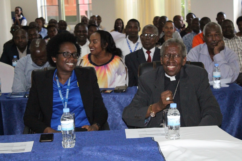 BK's chief executive Dr Diane Karusisi and the Bishop of Kabgayi Diocese Smaragde Monyintege at the event in Muhanga District on Friday.